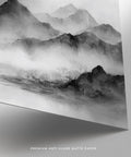 Pagoda nestled among fog and trees in ink wash, black and white landscape print.
