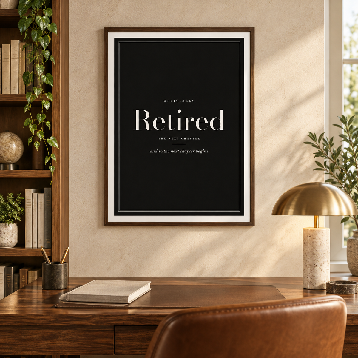 Black and cream retirement print above a desk in a quiet home study