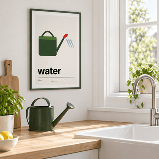 Green watering can with red rose on the wall above a kitchen sink