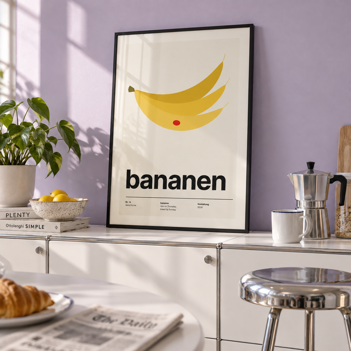 Yellow bananas with red sticker print in a breakfast kitchen against a lavender wall