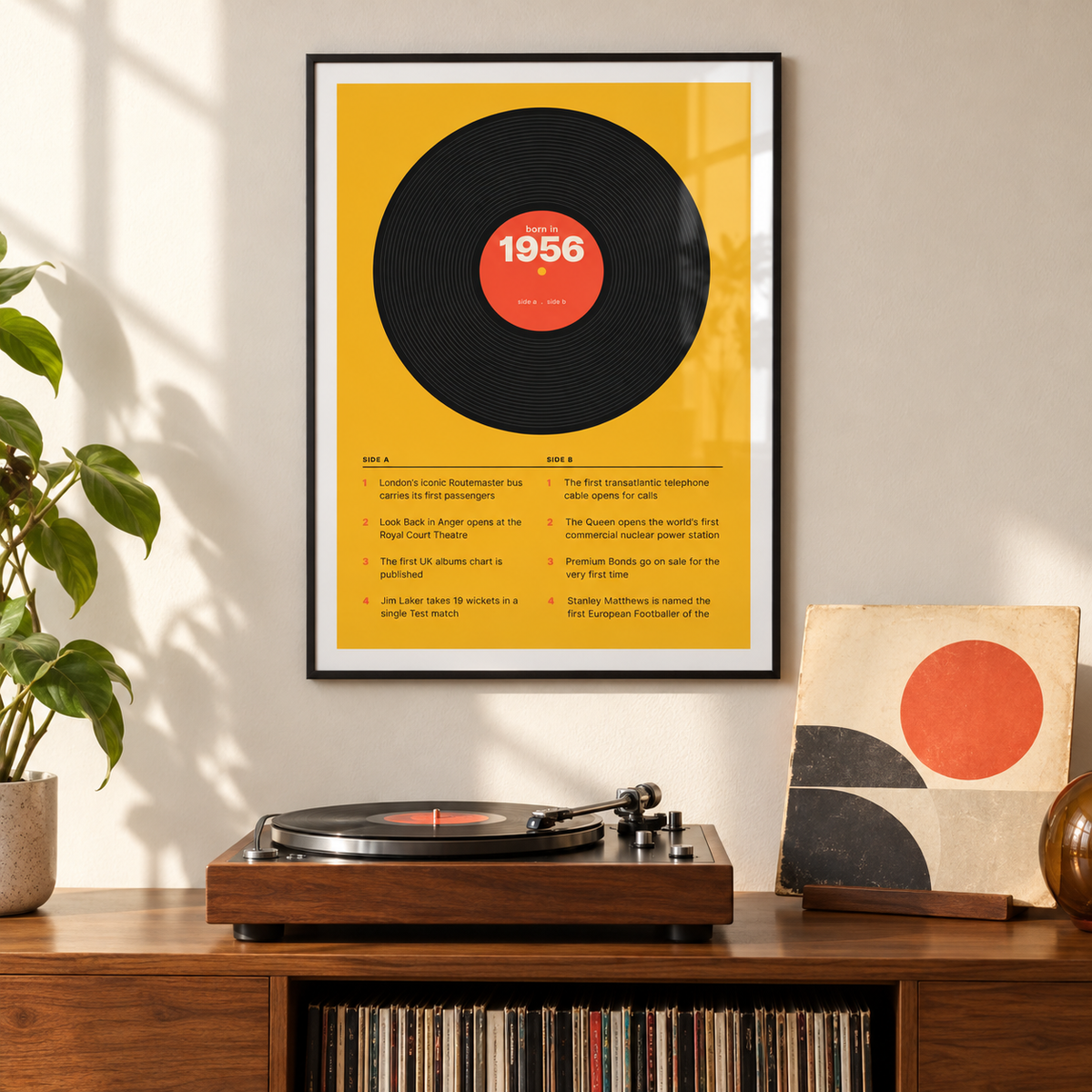 Black vinyl record print with a 1956 label on a wall in a lived in room