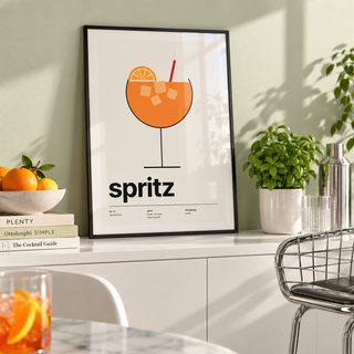 Spritz with ice and orange wheel print in a pistachio bar cabinet