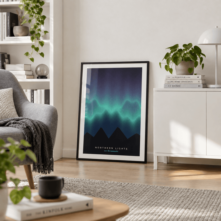 Northern lights mountain silhouette print against a light wall