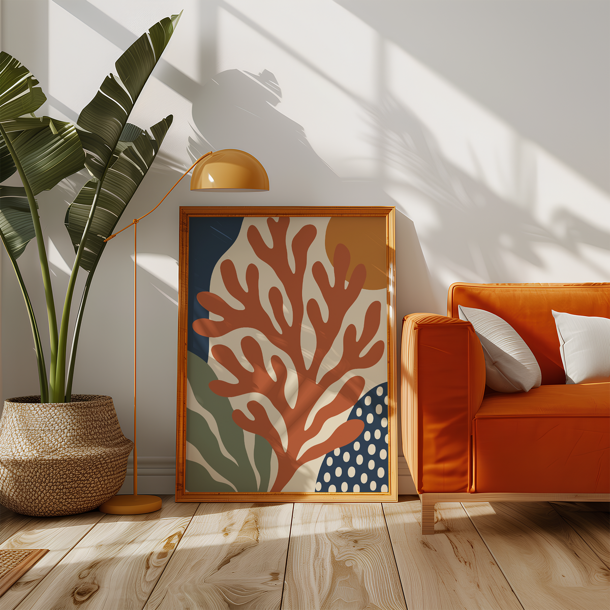 Rust red branching coral print beside an orange sofa in a sunny living room