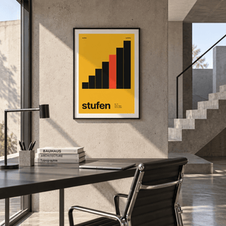 Mustard yellow steps print above a desk in a home office