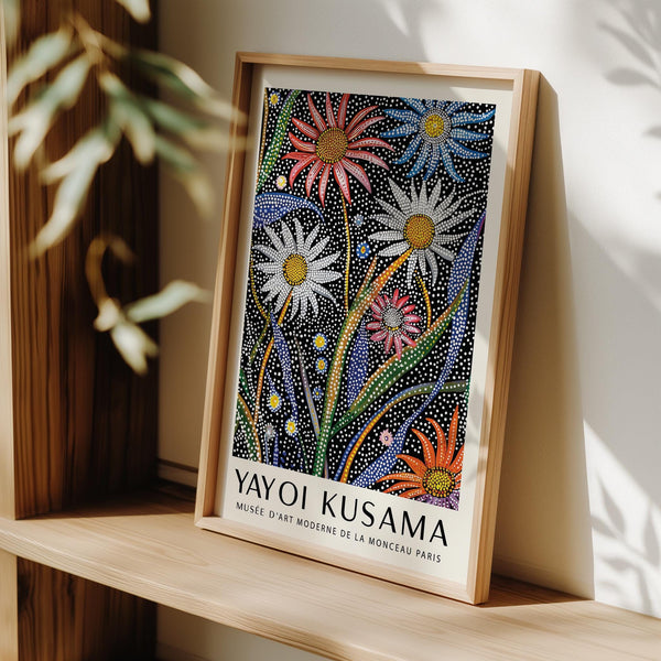 Vibrant abstract botanical wall art with orange and blue petals swirling among green leaves.