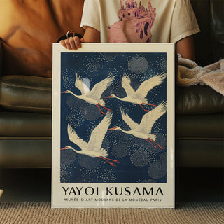 Wall art of cranes on blue sky, part of a Blue and White Prints series.