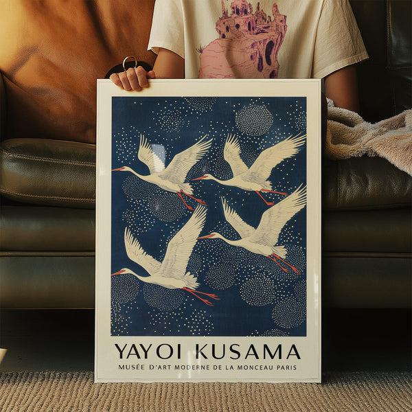 Wall art of cranes on blue sky, part of a Blue and White Prints series.