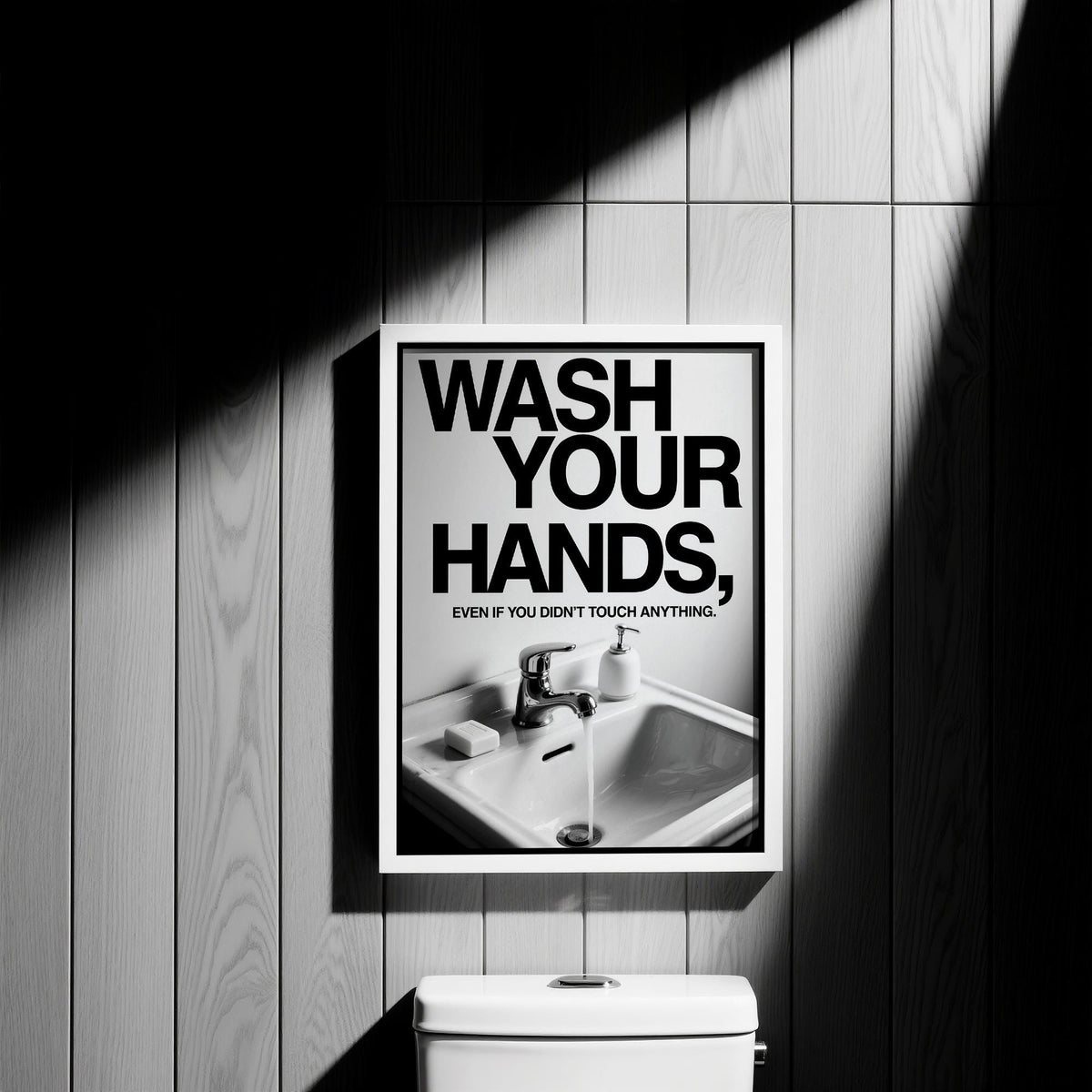 Toilet Wall Art with a sleek faucet and soap dispenser.