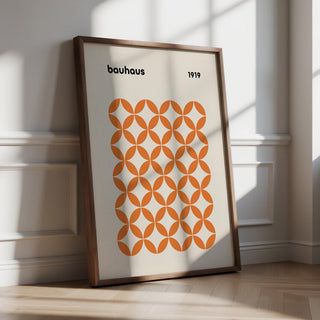 Orange minimalist print with intersecting circle pattern in bold Bauhaus style.