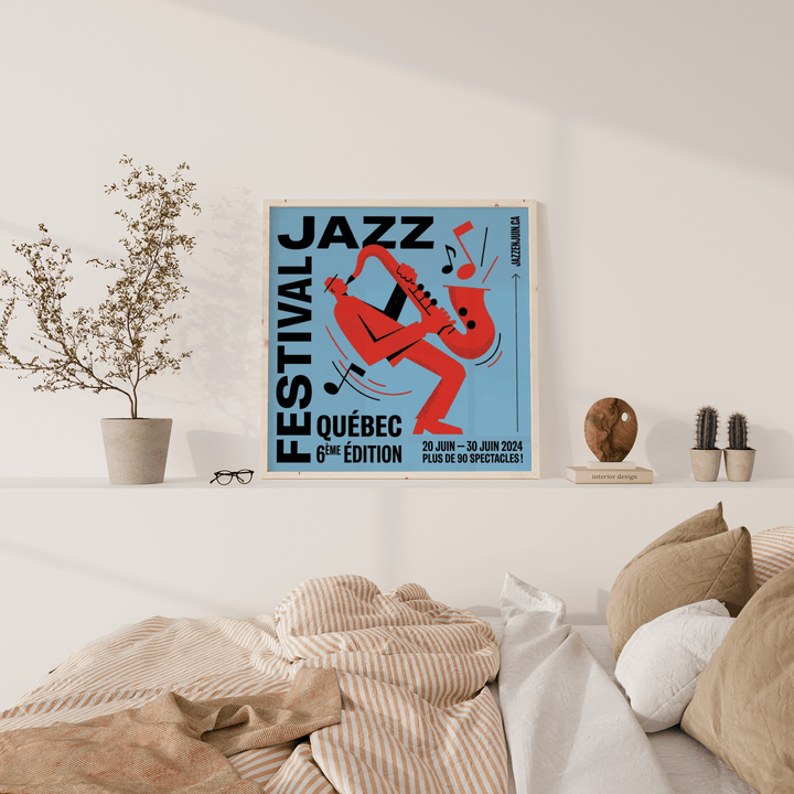 Music wall art of a red saxophone player with blue background leaning on a shelf with a plant