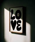 Black and white poster with rounded LOVE letters and heart detail
