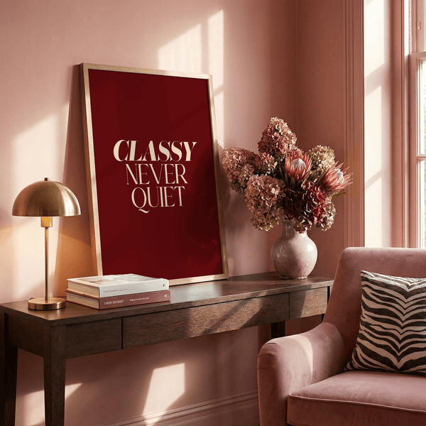 Red background poster presenting the words “CLASSY NEVER QUIET” in stacked layout