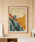 Rider on bicycle poster with layered mountains and textured sky, Mountain Biking Art Print