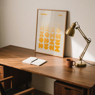 Modern wall art from the Posters Bauhaus series with symmetrical yellow shapes.