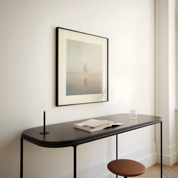 Abstract dreamlike poster with a floating feather and reflection symmetry