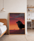 Lion silhouette set before gradient sky of red, orange, and purple hues