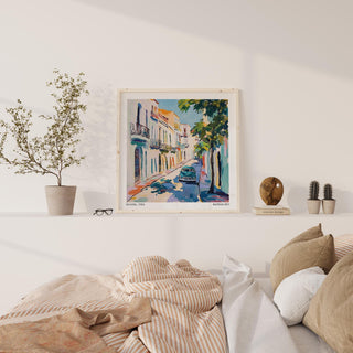 Cuba wall art with colonial details and a classic car in focus.