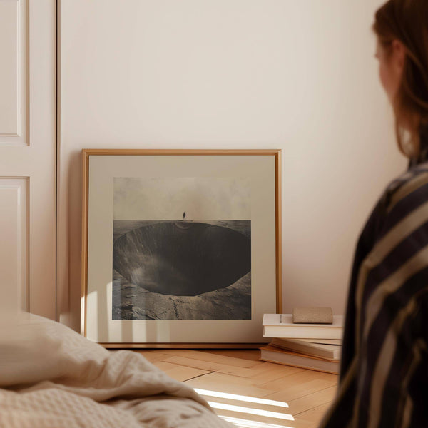 Surrealist wall art with symbolic lone figure composition