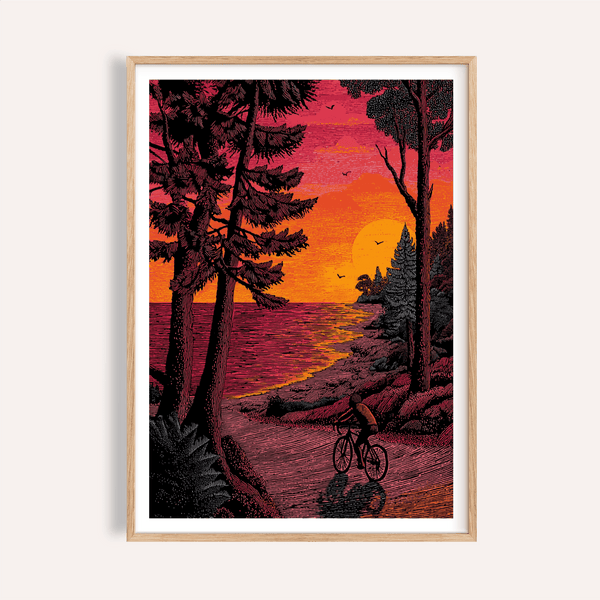 Foreground cyclist riding along a lakeside road poster with tall trees and large sun