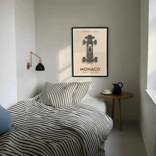 Centered racing car silhouette poster print with Automobile Club de Monaco header and bold MONACO lettering