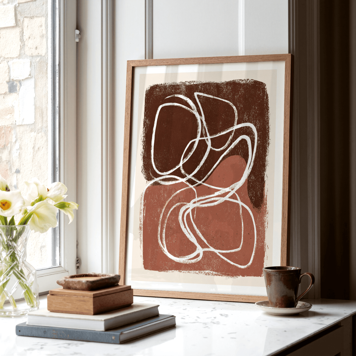 Textured abstract wall art featuring rounded shapes and rough-edged rectangle frame