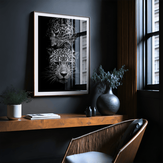 Minimalist wildlife wall art of leopards framed by subtle border