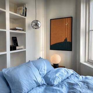 Night Silhouette Poster featuring Orange sky, Blue silhouette for living room