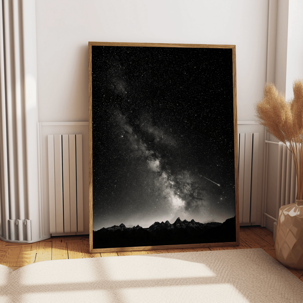 Monochrome astronomy wall art print with dense star field and bright galactic core over peaks
