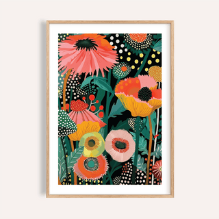 Framed close-up of tropical wall picture with pink and orange botanical illustration in wooden frame