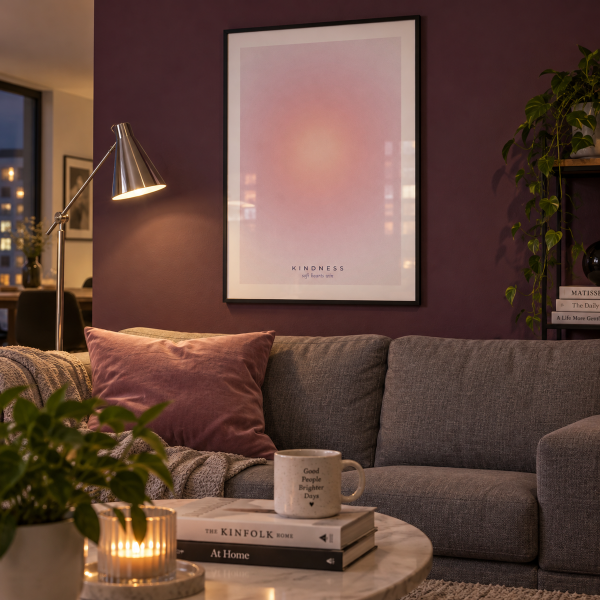 Warm pink gradient print in a living room against a plum wall
