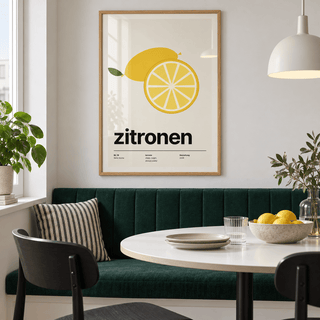 Swiss style lemon typography print above a banquette in an emerald dining