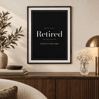 Elegant retired typography print above a wooden sideboard in a living room