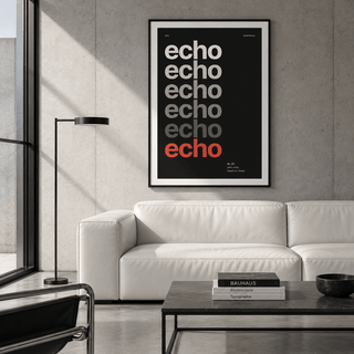 Black and cream word art print above a sofa in a living room
