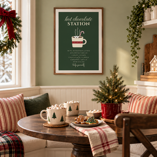 Green Christmas drinks sign print in a dining nook at Christmas