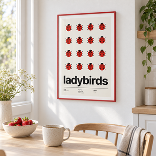Swiss style ladybird print above a breakfast table in a bright kitchen