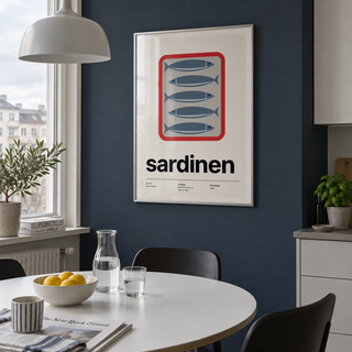 Swiss style tinned fish print in a dining corner against an ink blue wall