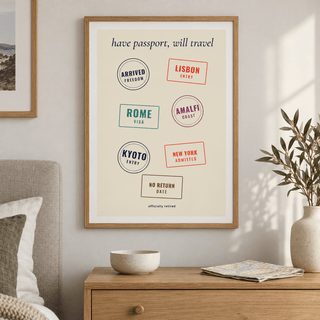 Have passport will travel print above the bed in a calm bedroom