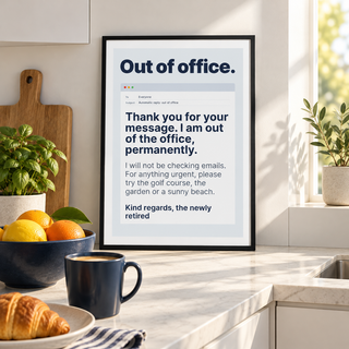 Automatic reply retirement print on a kitchen wall above the worktop