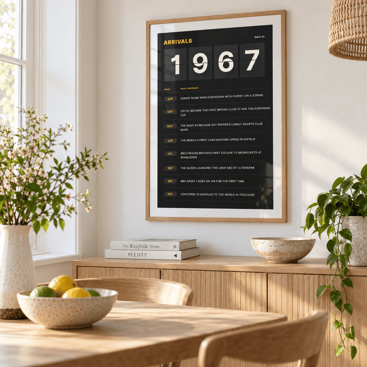 Black and amber 1967 birth year board print in a bright home interior
