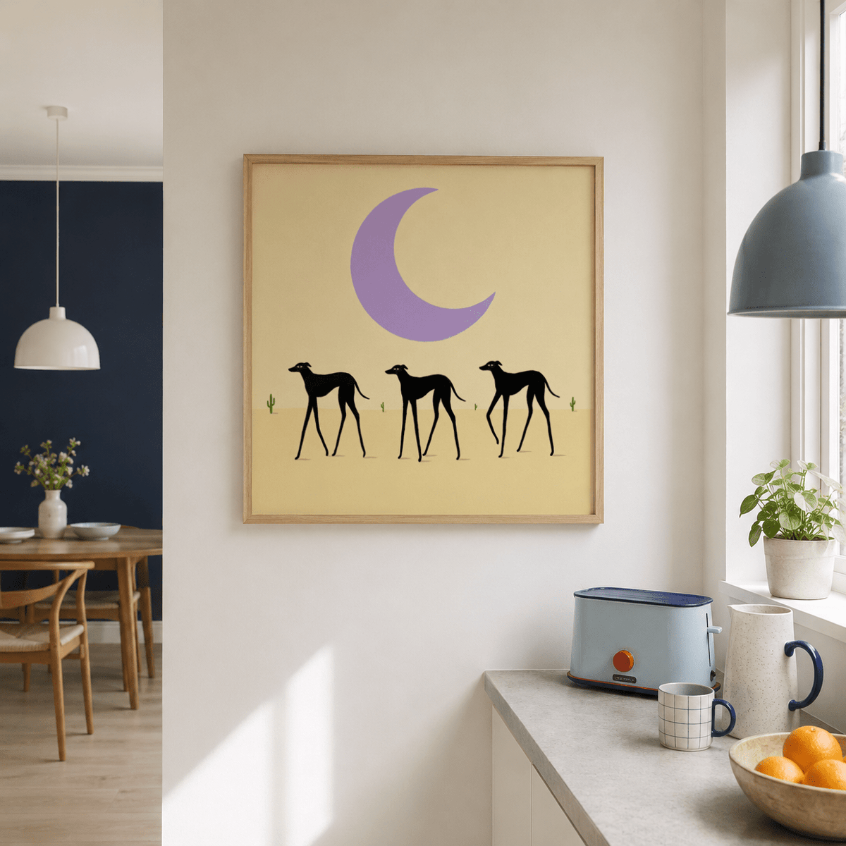 Crescent moon poster with three black dog silhouettes arranged in a horizontal row
