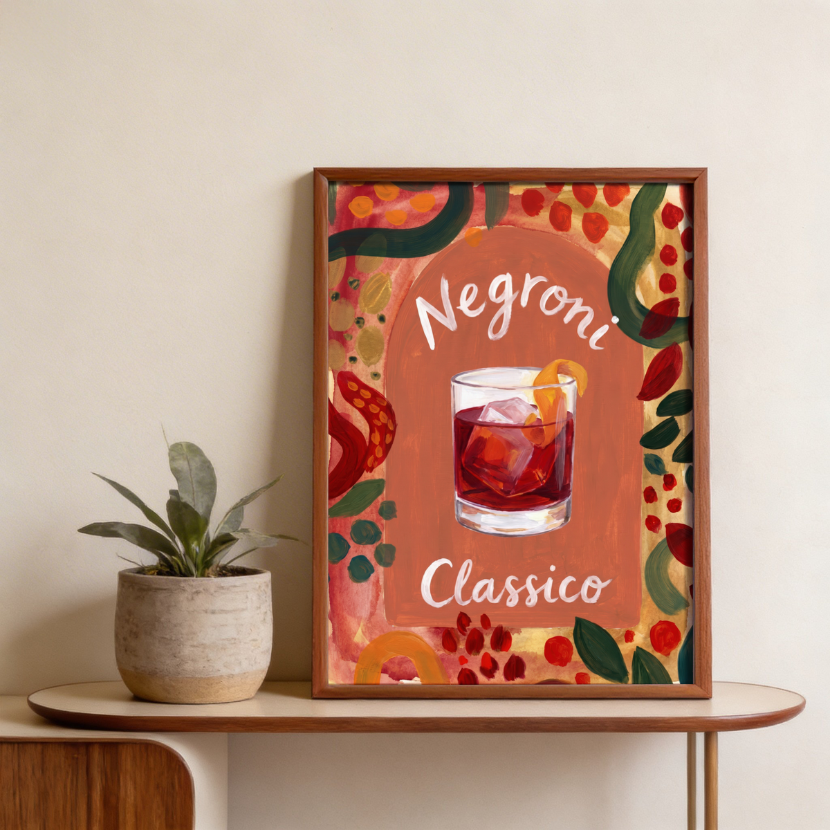 Gallery wall featuring Negroni Art Print alongside vintage liquor posters