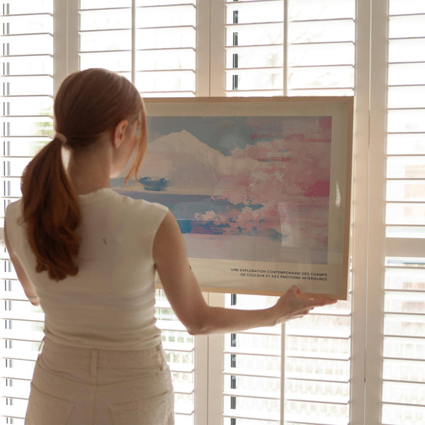 Modern decor with pastel-toned mountain landscape wall art on display