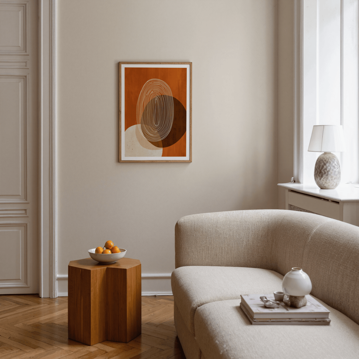 Orange brown beige geometric poster showing stacked rounded shapes