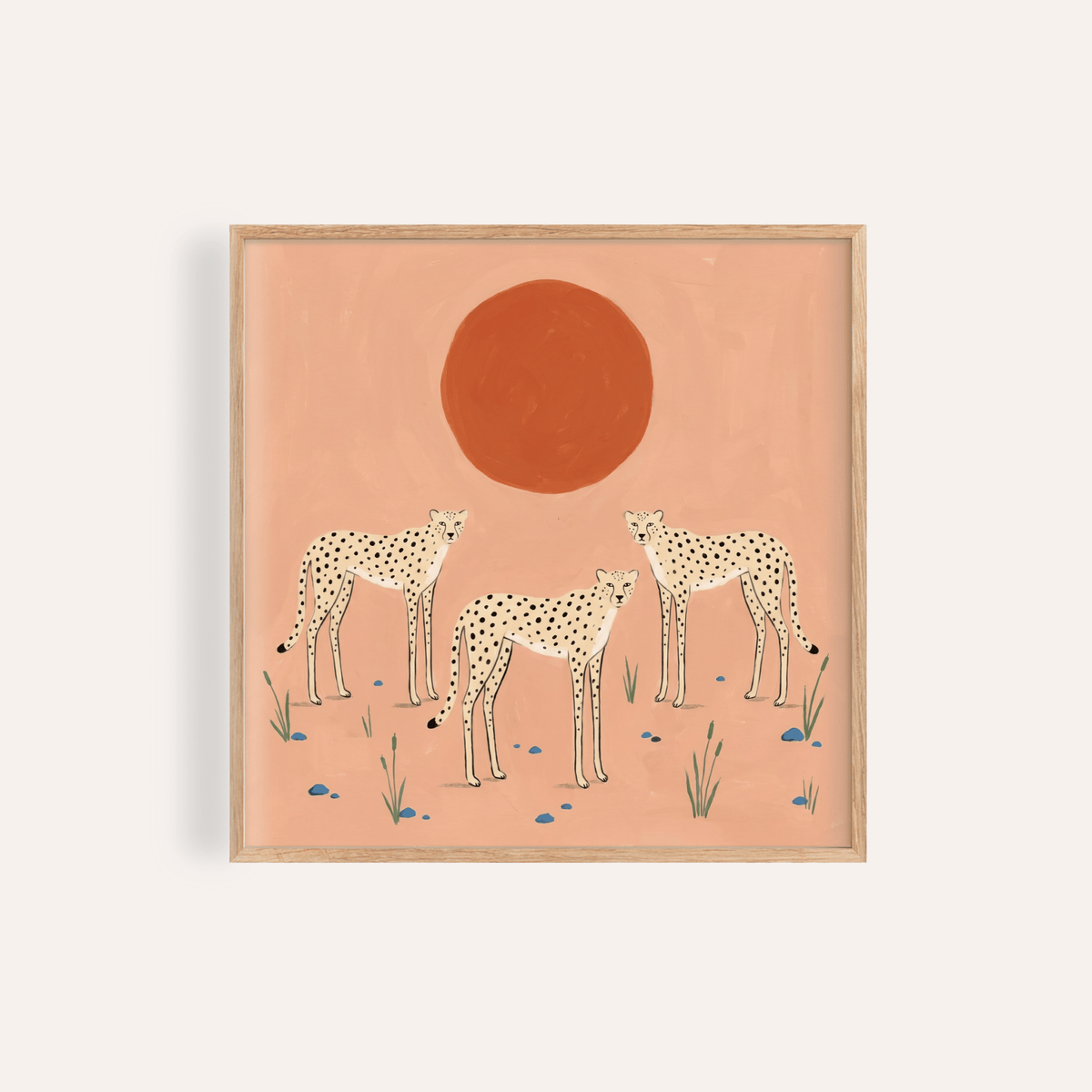 Illustrated cheetah trio wall art print with round sun and grasses