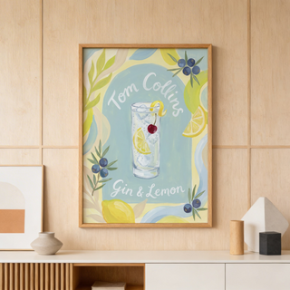 Featuring a Tom Collins cocktail poster with handwritten Tom Collins text and gin & lemon lettering