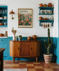 Mexican folk art wall decor with warm tones for eclectic spaces.