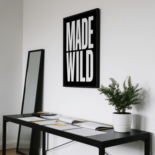Oversized letterforms printed in crisp black on matte white paper