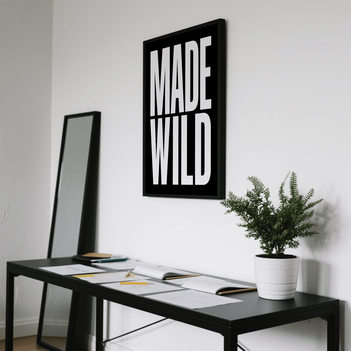 Oversized letterforms printed in crisp black on matte white paper