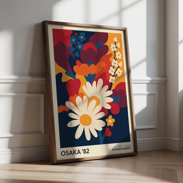 Bold wall decor art flower print with orange and navy accents.